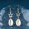 Allereyae Vintage Cowrie Drop Earrings Puka Shell Dangle Earrings Gold Star Dangling Earrings Hollow Star Earrings Jewelry for Women