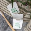 Desert Essence Tea Tree Oil Dental Tape - 12 Count (Pack of 1) - Naturally Waxed w/Beeswax - Thick Flossing No Shred Tape - On The Go - Removes Food Debris Buildup - Cruelty-Free Antiseptic