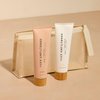 + Lux Unfiltered First Class Glow Travel Kit, Includes N°32 Hydrating Self Tanning Cream in Santal, N°14 Conditioning Body Cream in Santal and a Water Resistant Cosmetic Pouch, Easy Storage