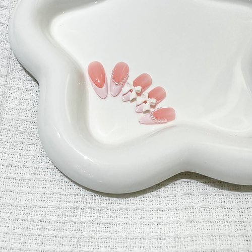 Almond Press on Nails French RIICFDD Short Fake Nails Nude Pink False Nails Cute Bow Nail Charms Design Acrylic Nails French Pearls Press on Nail Full Cover Glue on Nails for Women Girls 24 Pcs