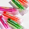 Lottie London Roller Glaze in Feeling Grape, color changing nourishing lip oil which adapts to the natural pH in your lips