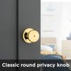 Kwikset Juno Interior Privacy Door Knob with Lock, Door Handle For Bathroom and Bedroom, Polished Brass Keyless Turn Lock Doorknob