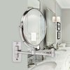 OVENTE 7" Wall Mount Makeup Mirror, 1X & 7X Magnifier, Adjustable Spinning Double Sided Round Reflection, Extend, Retractable & Folding Arm, Bathroom & Vanity Décor, Nickel Brushed MNLFW70BR1X7X