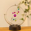 CHANGSHUN Electronic Perpetual Motion Battery Operated Home Office Desk Ornament (Solar System)