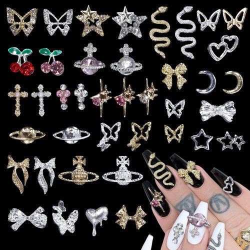 105 Pcs Silver+Gold Nail Gems Charms, Bow Moon Snake Planet Butterfly Heart Pink Cherry Nail Charms 3D Nail Art Jewelry Alloy Rhinestones Gems+Charms for Nail Art DIY Jewel Accessories