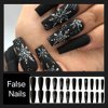 Christmas Press on Nails Long Coffin Fake Nails Black False Nails with Snowflake Design Glue on Nails Glossy Full Cover Stick on Nails Ballerina Acrylic Nails for Women Winter Manicure 24Pcs