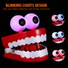Chattering Teeth Wind up Toy: Walking Teeth Toy with LED Eyes Funny Fake Teeth Clockwork Toy Dentures Joke Toys Party Favors
