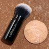 LAURA GELLER NEW YORK Get Glowing Kit (2pc): Baked Balance-n-Glow Illuminating Powder Foundation, Tan + Airbrush Kabuki Makeup Brush