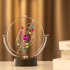 CHANGSHUN Electronic Perpetual Motion Battery Operated Home Office Desk Ornament (Solar System)