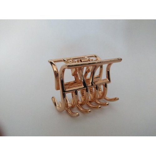 Small gold tone geometric metal hair claw clip