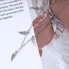 Allereyae Vintage Layered Wing Dangle Necklace Angel Wing Pendant Necklace Tiny Wing Choker Necklace Silver Angel Wing Necklace Jewelry for Women