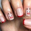 Christmas Short Square Fake Acrylic Nails with Red French Tip, Snowflake Designs, and Winter Xmas Nail Art for Women and Girls