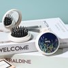 Mini hairbrush, pocket hairbrush with mirror, portable for purse/pocket, travel size (Black flowers and plants)