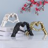 DOVDOV Hand Bone Hand Heart Statue, Black Home Decor, Halloween Table Decorations, Scary Finger Decorative Sculpture, Halloween Decorations Coffee Table Bookshelf Living Room Bookshelf.