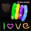 DJBoomy Light Up Pop Fidget Tubes: Glow Sensory Tube Stretch Toys for Kids Party Favors - Mini Plastic Pull Tubes Bulk with LED Lights Glowing Stick in the Dark (12 Pcs)