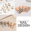SUTOKAKA 1 Box Champagne Gold Nail Art Rhinestones Multi Shapes 3D Flatback Bedazzling Crystals Non Hotfix Nails Gems Stones with Tweezer Picker Pencil for Manicure Face Eyes Makeup DIY Crafts