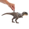 Mattel Jurassic World Wild Roar Dinosaur Toy with Sound & Attack Move, Ekrixinatosaurus Posable Action Figure Includes Digital Play, 11 inches Long