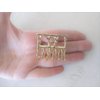 Small gold tone geometric metal hair claw clip
