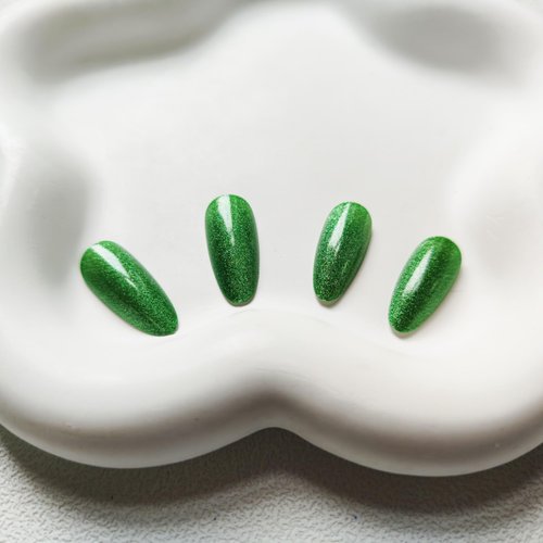 Green Press on Nails Almond Shape Fake Nails Medium False Nails with Cat Eye Design Glitter Acrylic Nails Full Cover Artificial Nails Glossy Stick on Nails for Women St. Patrick's Day Manicure 24Pcs