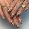MISUD Press on Nails Medium Almond Fake Nails Glossy Glue on Nails Gold Chrome Acrylic Nails Stiletto Artificial Nails Swirl Star Sun Stick on False Nails with Design 24 pcs