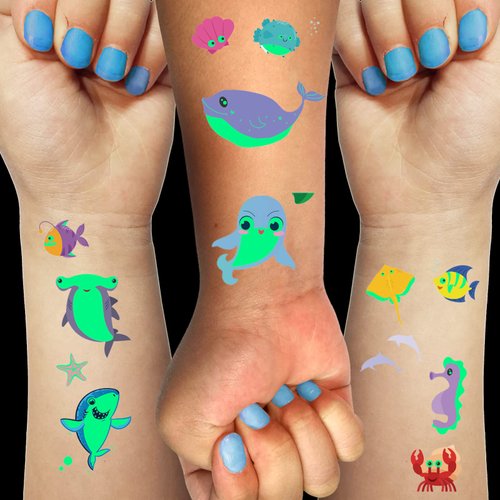 Luminous Temporary Tattoos Stickers for Kids 150 Pieces Mixed Style Glow In The Dark Sharks Whales Dolphins Octopus Crab Fish Tattoos Marine Animals Glow Party Supplies Gifts for Children Boys Girls