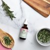 Camille Rose Rosemary Oil Strengthening Hair and Scalp Drops | 1.9 fl oz | Castor Oil, Peppermint & Rosemary Essential Oils | Encourage Hair Growth & Strengthen | Natural Hair Oil Dry Scalp