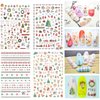 1000 Patterns Christmas Nail Art Sticker Decals, Kalolary Self-Adhesive Nail Stickers Santa Claus Snowflake Snowman Christmas Bell Tree Stick Elk for Christams Nail Decoration Gift(12 Sheets)