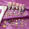 50pcs 3D Gold Nail Charms for Acrylic Nails Mix Styles Rhinestones for Nails Metal Nail Jewels for Nail Art Shiny Zircon Nail Rhinestones Alloy Nail Charm Pearl Nail Gems Cute Charms for Nails Design