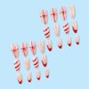 Christmas Press on Nails Medium Almond Fake Nails Snowflake False Nails with Christmas Hat Design Nude Glue on Nails Glossy Acrylic Full Cover Bowknot Stripe Stick on Nails for Women Manicure 24Pcs