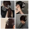 Bone Hand Hair Clips Silver Metal Halloween Hair Accessories for Women Girls Playful Skull Skeleton Hand Hair Claw Clips Hairpins Strong Hold Nonslip Hair Clip for Day of the Dead Decoration 1 Pcs
