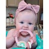 Itzy Ritzy Silicone Teether with Rattle; Rattle Teether Features Rattle Sound, Two Silicone Teething Rings and Raised Texture to Soothe Gums; Ages 3 Months and Up (Pink Rainbow)