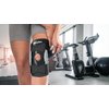 MUELLER Sports Medicine Hinged Wrap Around Knee Brace for Adults, Men and Women Knee Support for Pain, Injury, or Arthritis, Black/Gray,12-21 Inches, One Size Fits Most