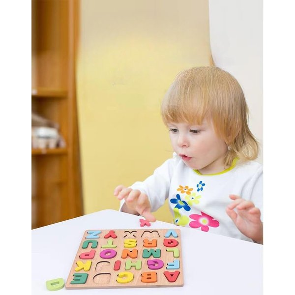 Generic Montessori-style wooden alphabet puzzle for kids. Encourages letter recognition, stacking, and learning through play. Ideal for toddlers and preschoolers.