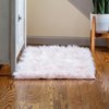 Super Area Rugs Ultra Soft & Fluffy Faux Sheepskin Rug, Light Pink 2 x 3 Feet Carpet for Bedroom Living Room