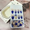 Blue Press on Nails Almond Medium Artificial False Nails Blue Rhinestones Gold Foil Design Acrylic Nails Full Cover Glossy Coffin Fake Nails Charm French Stick on Nails Set Glue on Nails for Women