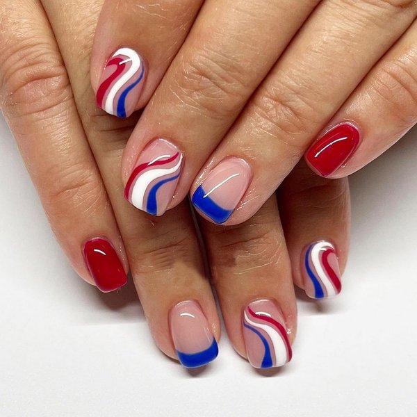 Independence Day Press on Nails，4th of July celebrate American Red Blue White Swirl Design Fake Nails,Patriotic French Tip False Nails for Women and Girls DIY Manicure Decorations 24 PCS