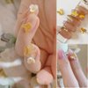 Spring Nail Art, 7Boxes Holographic Flower Nail Charms 3D Pink White Flower Bow Gold Butterfly Nail Art Design Manicure DIY Decoration for Acrylic Nails
