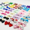 DORUI Dog Bows, Cute Hair Bowknot with Rubber Bands Handmade for Puppy Yorkie Grooming Hair Accessories & Varies Patterns Topknot Bows(70 pcs Upgrade Rubber Bands)