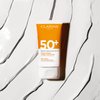 Clarins Dry Touch Face Sunscreen | Broad Spectrum SPF 50+ | UVA/UVB Protection | Lightweight and No White Cast | Enriched with Antioxidants | All Skin Types, including Sensitive Skin | 1.7 Ounces