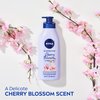 NIVEA Oil Infused Cherry Blossom and Jojoba Oil Body Lotion, Non-Greasy Cherry Blossom Scented Lotion Moisturizes for 24+ Hours, 16.9 Fl Oz Pump Bottle