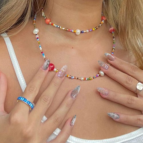 YOSOMMK Press on Nails Medium Almond Fake Nails Glossy Glue on Nails Silver 3D Swirl Acrylic Nails Artificial False Nails with Luxury Designs for Women