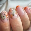 Short Press on Nails Oval Fall Orange French Tip Fake Nails with Cute Flower Designs Acrylic Nails Press ons Reusable Glue on Nails for Women Daily Wear 24 Pcs
