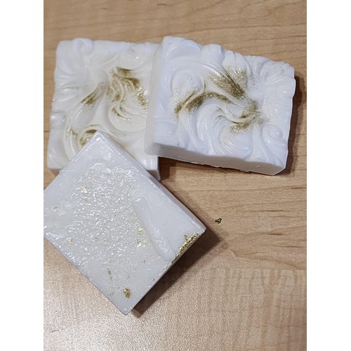 Melody is a Handmade Shea Butter and White Soap Bar with Cucumber Melon Scent, Gold Glitter
