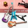 Suartus Miniature Guitar Miniature Bass Model - 4Pcs 1:12 Mini Musical Instrument Bass Guitar Wooden Guitar Model Display Ornaments for Mini Music Room Accessories Model Home Decoration