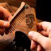 Enjoy The Wood Beard Comb for Men - Pocket Folding Combs for Mustache & Hair Travel, Natural Wooden Comb with Real Man Engraving - Light Brown, Perfect for Use with Beard Balm Oil