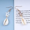 Allereyae Vintage Cowrie Drop Earrings Puka Shell Dangle Earrings Gold Star Dangling Earrings Hollow Star Earrings Jewelry for Women